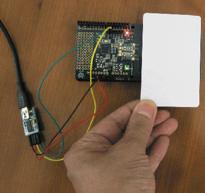 Place a Mifare Classic card over the Adafruit PN532 RFID/NFC Shield