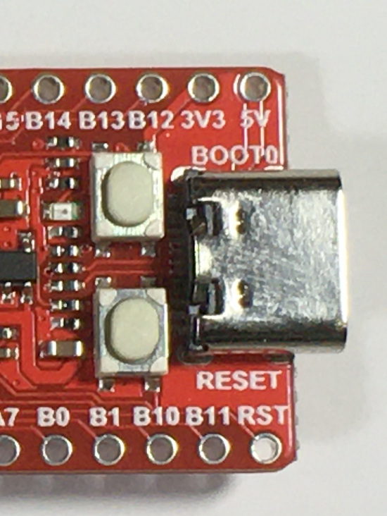 Reset and boot button on the Sipeed Longan Nano Development Board