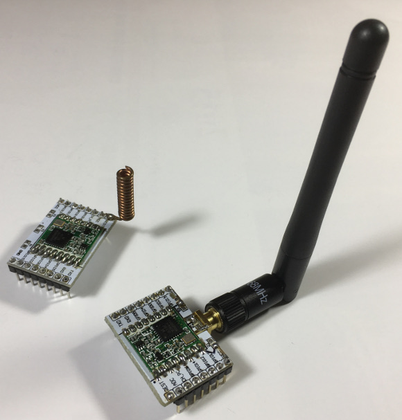 ESP8266 module adapter plate with RFM95 LoRa module and dipole antenna