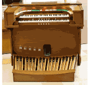 Percussive organ